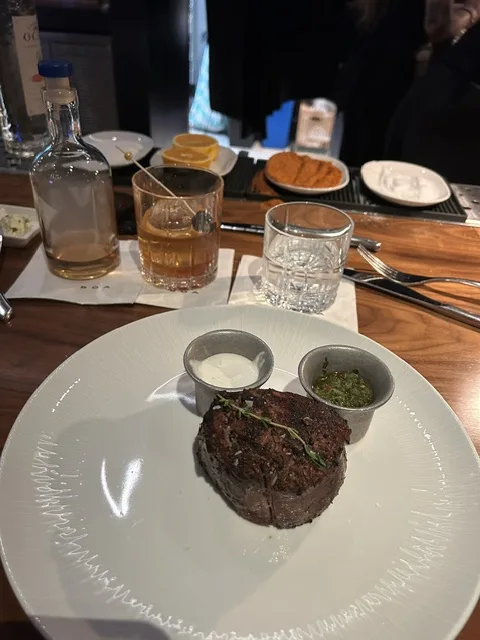 Filet mignon with sauce selections at BOA Steakhouse Austin
